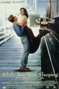 Poster for While You Were Sleeping (1995).